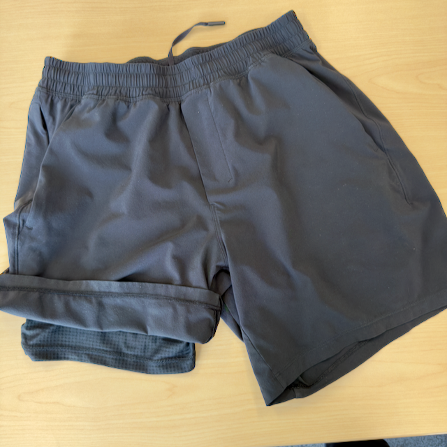 Lululemon Pace Breaker Lined Shorts 7 inch in black, flat lay
